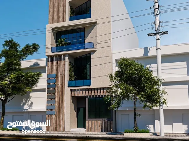 بناية تجارية +بيت للبيع في دور النفط قرب سنتر القمر المنير