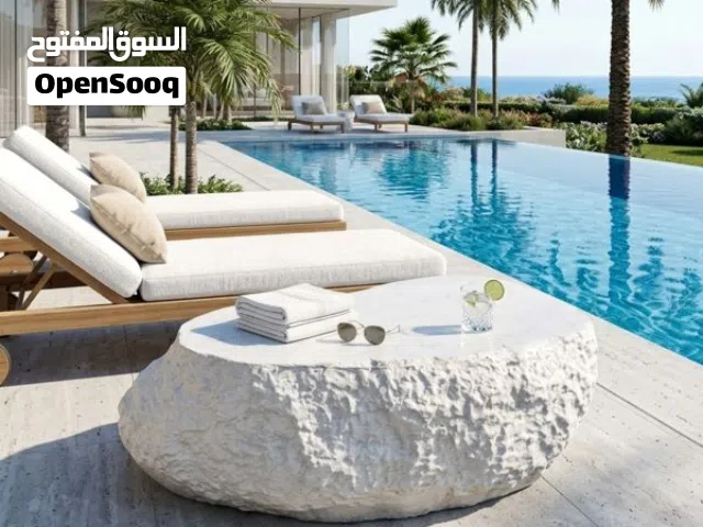 طاولة قهوة فخمة بتصميم صخري طبيعي – للمساحات الخارجية والداخلية الراقية