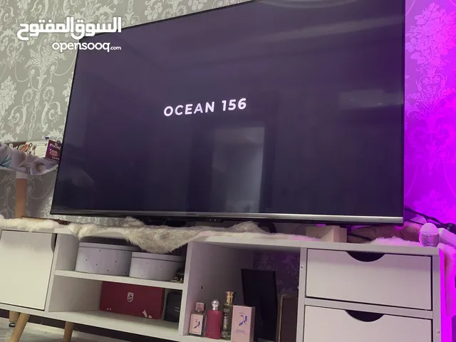 تلفاز ذكي 55 بوصة مع الطاولة