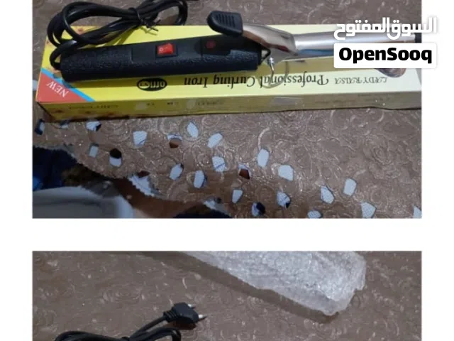 مكواة لتجعيد الشعر