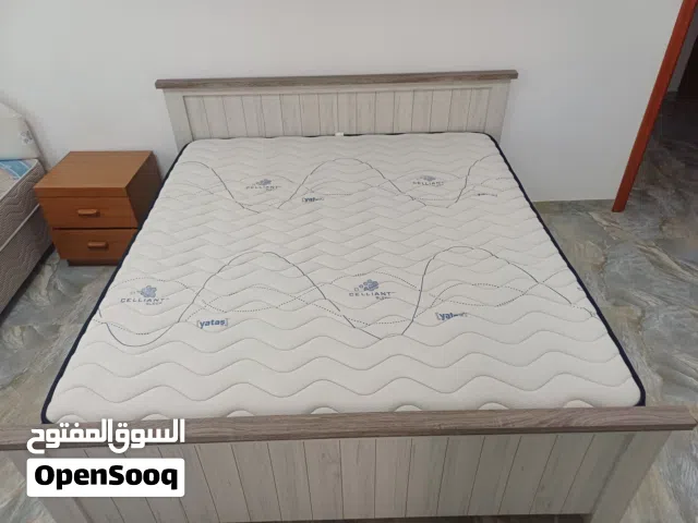 High quality mattress and a simple bed frame.