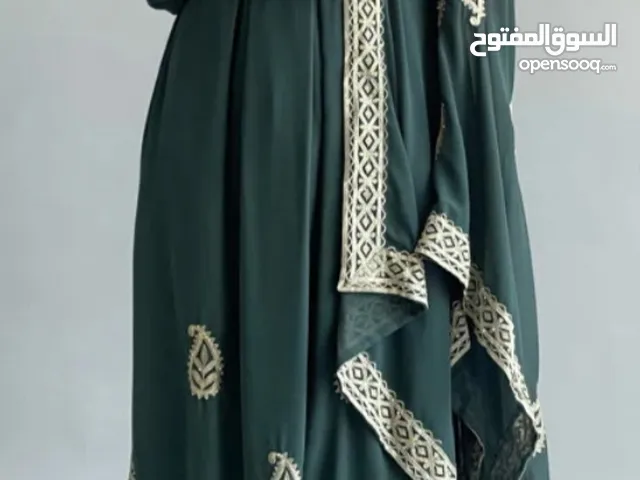 فستان سهره او اعراس اخضر زبتي بخيوط ذهبيه