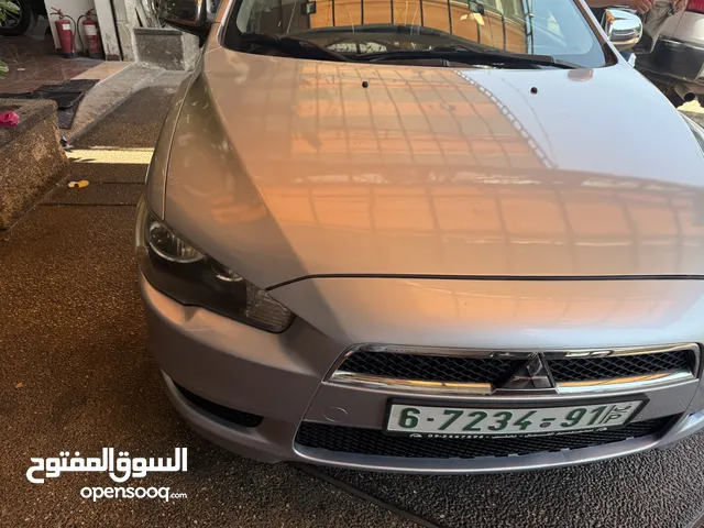متسوبيشي لانسر 2012سيارة جديدة من ناحية مطور وجير وعلى الفحص