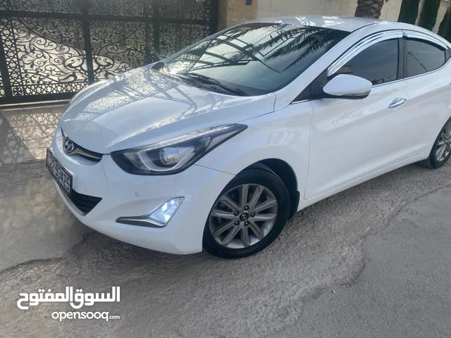 هيونداي افانتي MD 2014 لون ابيض فحص اربعه جيد مرفق بالصور الله يطرح البركه لصاحب النصيب