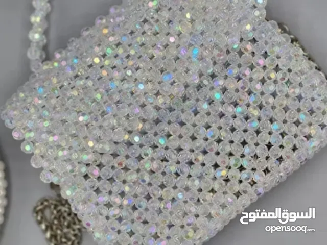 شنطه يد خرز