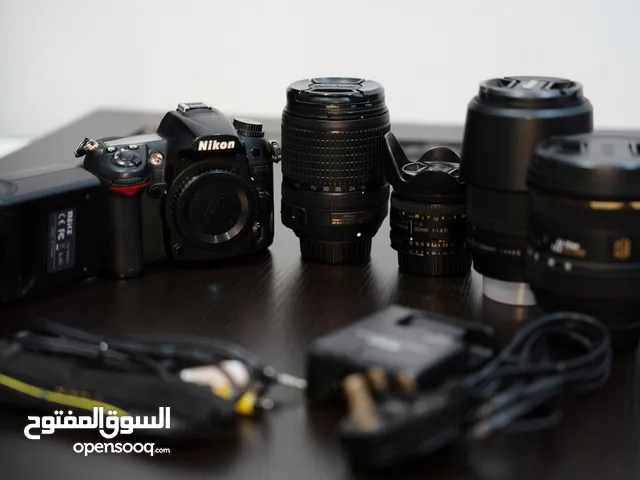 Nikon d7000 full gear body + 4 lenses + flash + bag ( exellent condition )