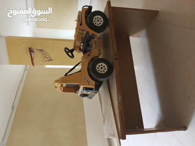 سيارة ركوب لون اصفر