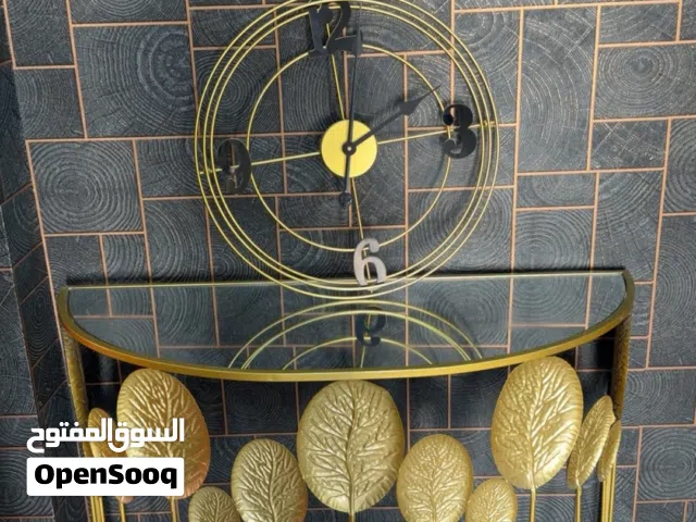 طاولة وساعه