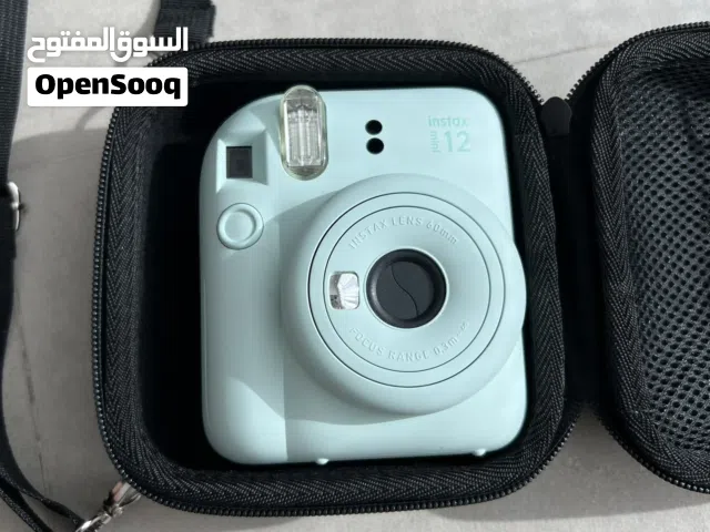 Fujifilm instax mini camera with bag