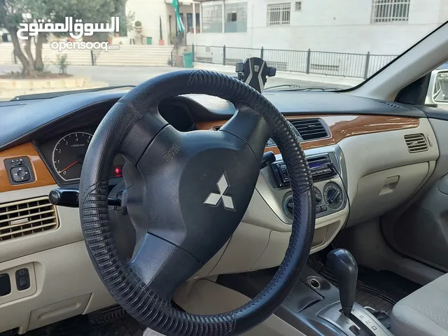 لانسر ابيض 2013