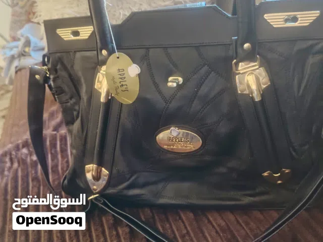 :حقيبة يد نسائية سوداء ماركة Apple's - جديدة تماماً بالتاغ (غير مستخدمة)