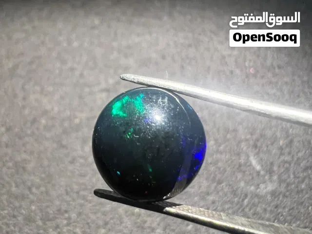 حجر اوبال أثيوبي فاير أسود طبيعي natural black fire Ethiopian opal