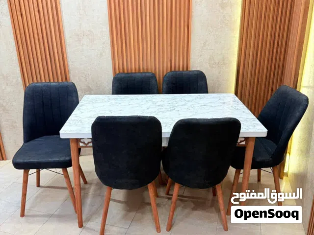 ميز طعام 6 كرسي سطح خشب ثابت
