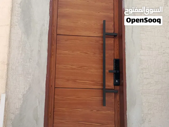 بوابتك إلى الفخامة تصميم وتنفيذ أبواب حسب الطلب