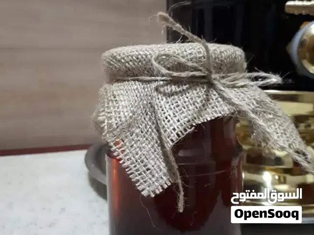 عسل طبيعي مكفول من الغش والحرام