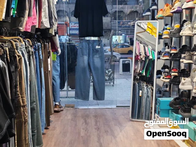 محل ملابس واحذية رجالي للبيع