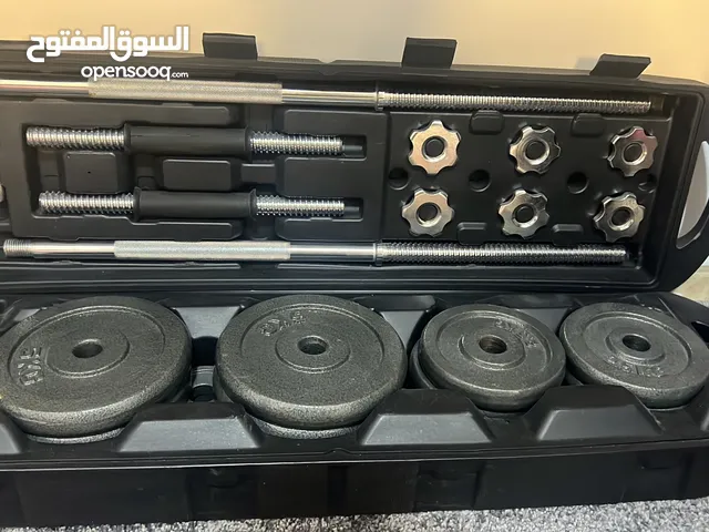 شنطه اثقال 50 كيلو جديده نيو معاها بار طويل وبار زقزاق وزوز دمبلس بالكرسي