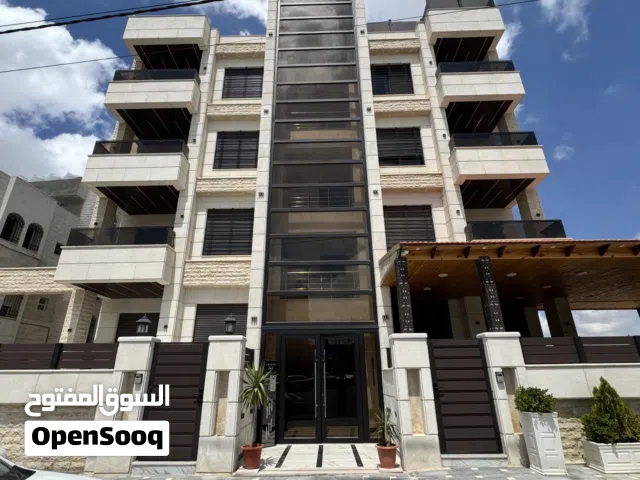 شقة للبيع طابق ارضي في اجمل منطقة بالمقابلين ( ابو الراغب ) بمساحة 212 متر وترس عدد 2 ( لم تسكن )