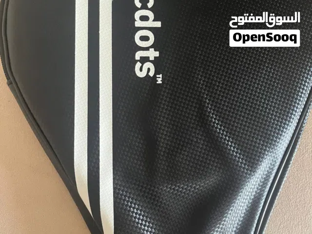 Padel racket with cover