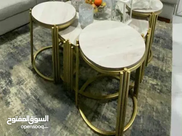 طاوله بيضاويه مع اربع طاولات اصغار