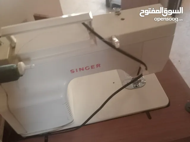 ماكنة خياطه سنجر ممتازة جدا البيع بسبب السفر