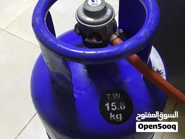 أسطوانة غاز أدنوك بحالة ممتازة مع المنظم والخرطوم (فيها غاز)