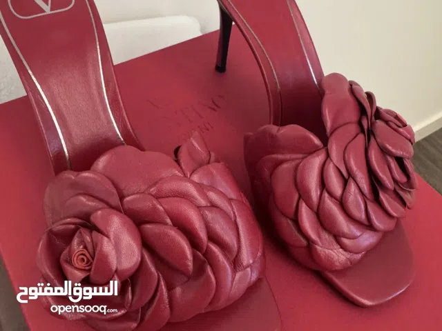 Red With Heels in Abu Dhabi