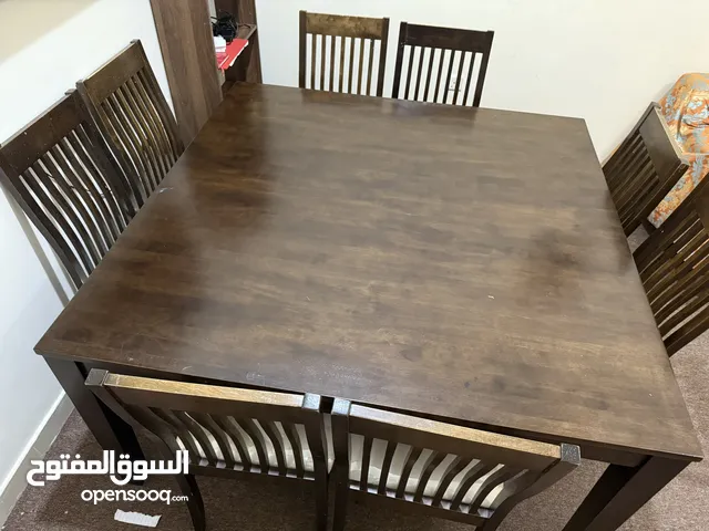 8 seater wooden(dark walnut color) Dining Table in excellent condition 150x150 cm