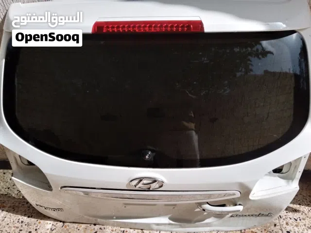 كوفني خلفي سنتافي 2012كامل بالمقبض والجناح والمرش والقفل به نقرات بسيطه