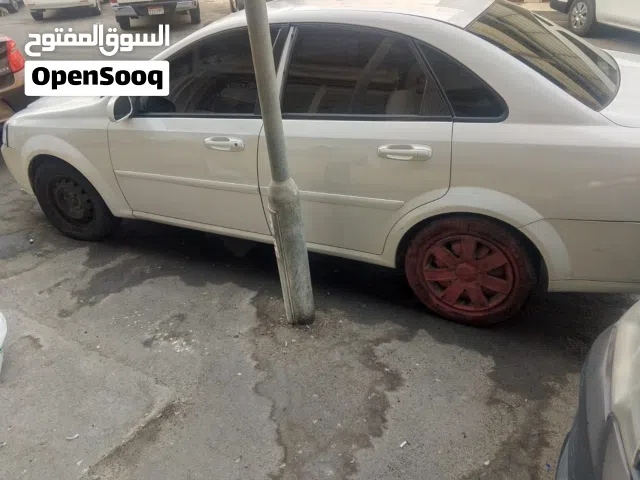 Chevrolet optra 2011 model white color in a good condition