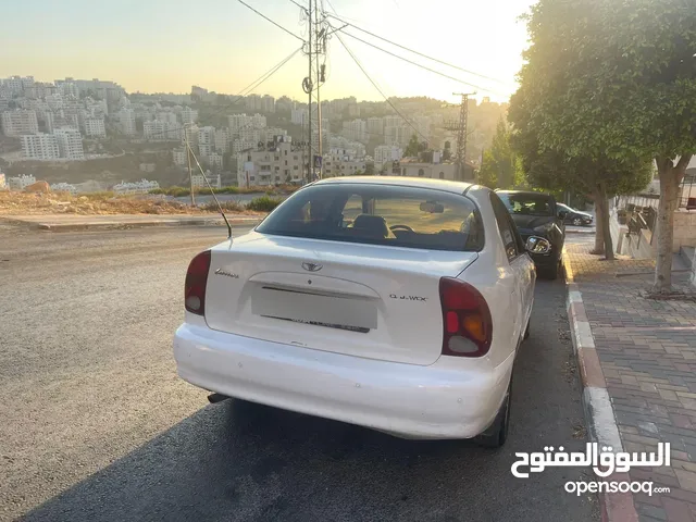 دايو لانوس موديل 2002 جير عادي سيارة مشالله ولا ضربة افحص وين بدك ترخيص تامين دفع فقط كاش