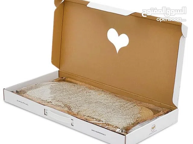 “قطرات الذهب الإيراني: عسل أصيل من قلب الطبيعة”