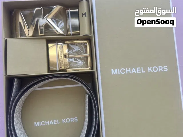 Brand new Michael Kors belt set with two interchangeable