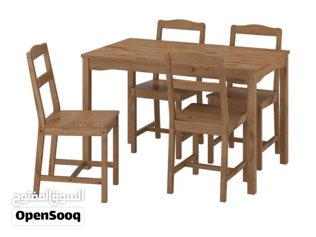 IKEA dining table with 4 chairs (almost new)