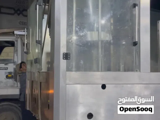 مكينة تعبئة وتغسيل وتغطية الصحات