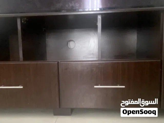 Dark wood TV cabinet with storage and glass doors - good condition ( TV not included for sale )