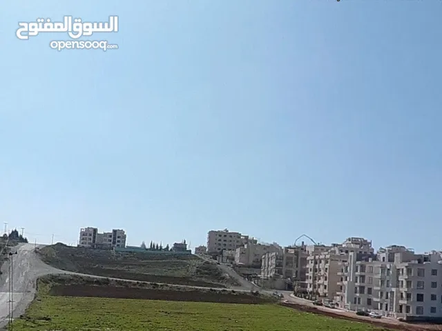اراضي للبيع في الحويطي / بالقرب من مدارس العالميه ( شارع المطار )