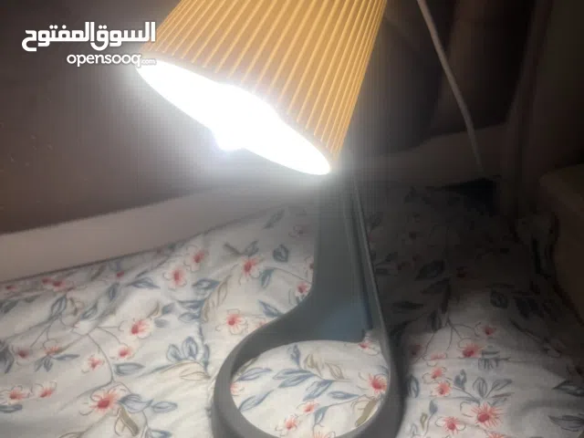 This is an IKEA SVALLET work lamp in dark grey.  مصباح عمل SVALLET باللون الرمادي الداكن