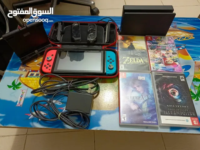 NINTENDO SWITCH WITH GAME AND ACCESORIES
