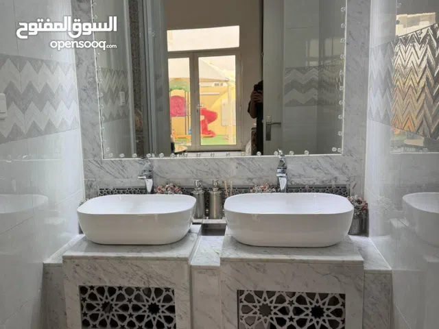 A clean, unused marble sink