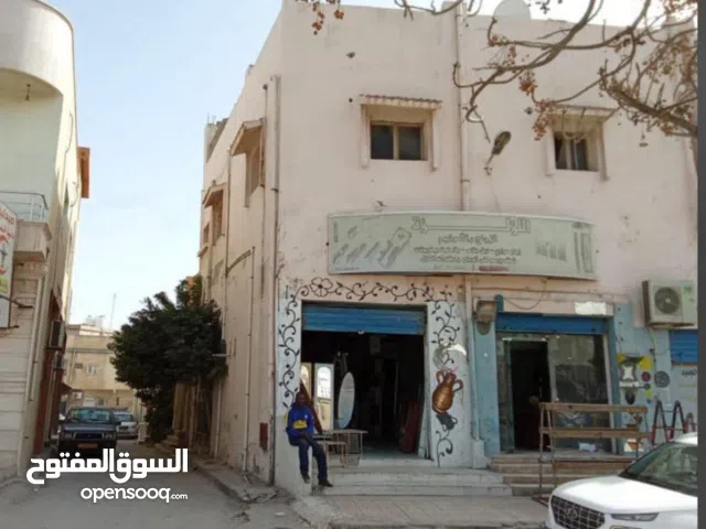 مبنى تجاري غوط الشعال الطريق الرئيسي