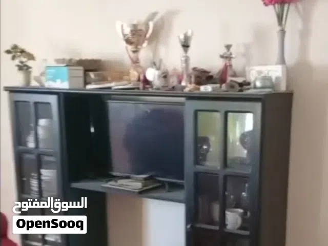 Beautiful cabinet with glass doors.