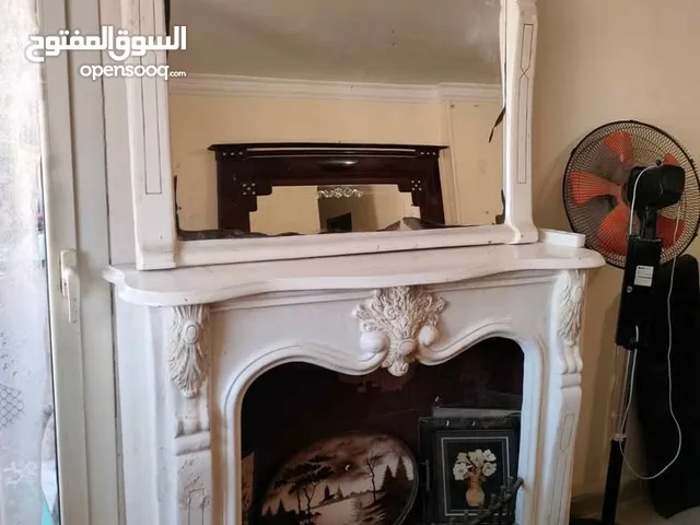 دفايه من الرخام الطبيعي كبيره معاها المرايا بتاعتها زجاج و رخام طبيعي