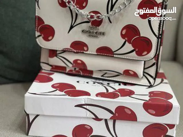 حقيبة COACH الأصلية – لمسة أنيقة بطابع مرح