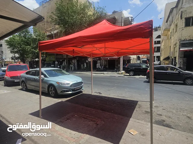 مظلات وحدائق خارجيه جميع الالوان والاحجام موجودين في ابو علندا والجلود جميع انواع الجلود والاقمشه