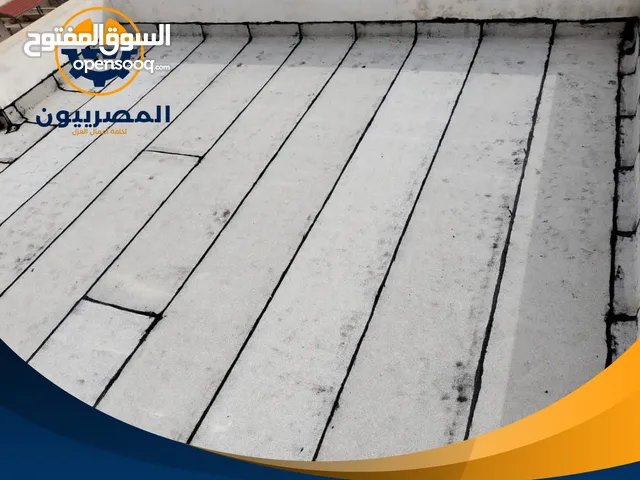 ابو علي لعزل الاسطح بالزفتة الساخنة والرولات وصيانة الشوارع وخلط اسفلت
