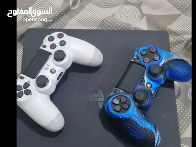 playstation 4 slim 500gb with 2 controllers and 7 games