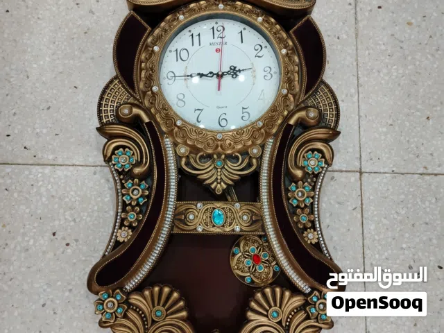 ساعة جدارية رقاص كبيرة