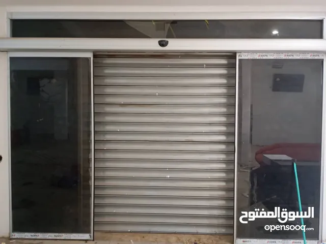 باب كهربائي زجاج للمحلات التاجزية