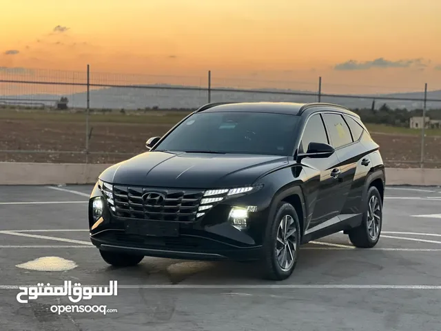 هونداي توسان/2022 فل الفل بدون فتحة سقف  2x4 ///240Hp بنزين + كهرباء  ( Haybrid) 1600cc